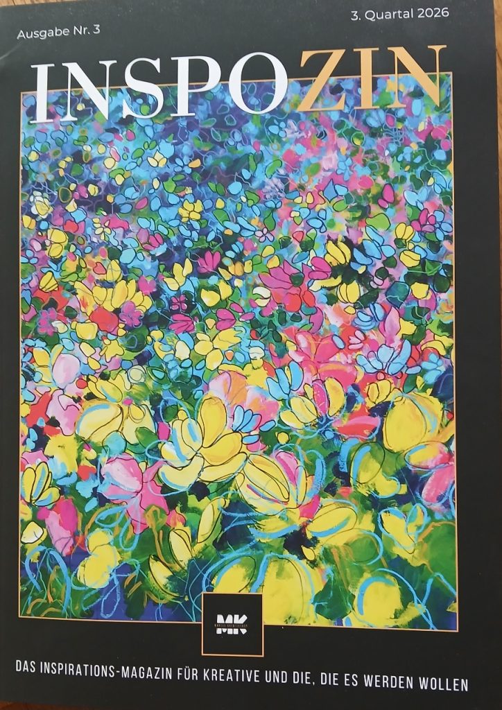 Titelseite der 3. Ausgabe des "Inspozin": in der Mitte ein Bild mit bunten Blüten. Schwarzer Rand, unten steht der Text: Das Inspirations-Magazin für Kreative und die, die es werden wollen